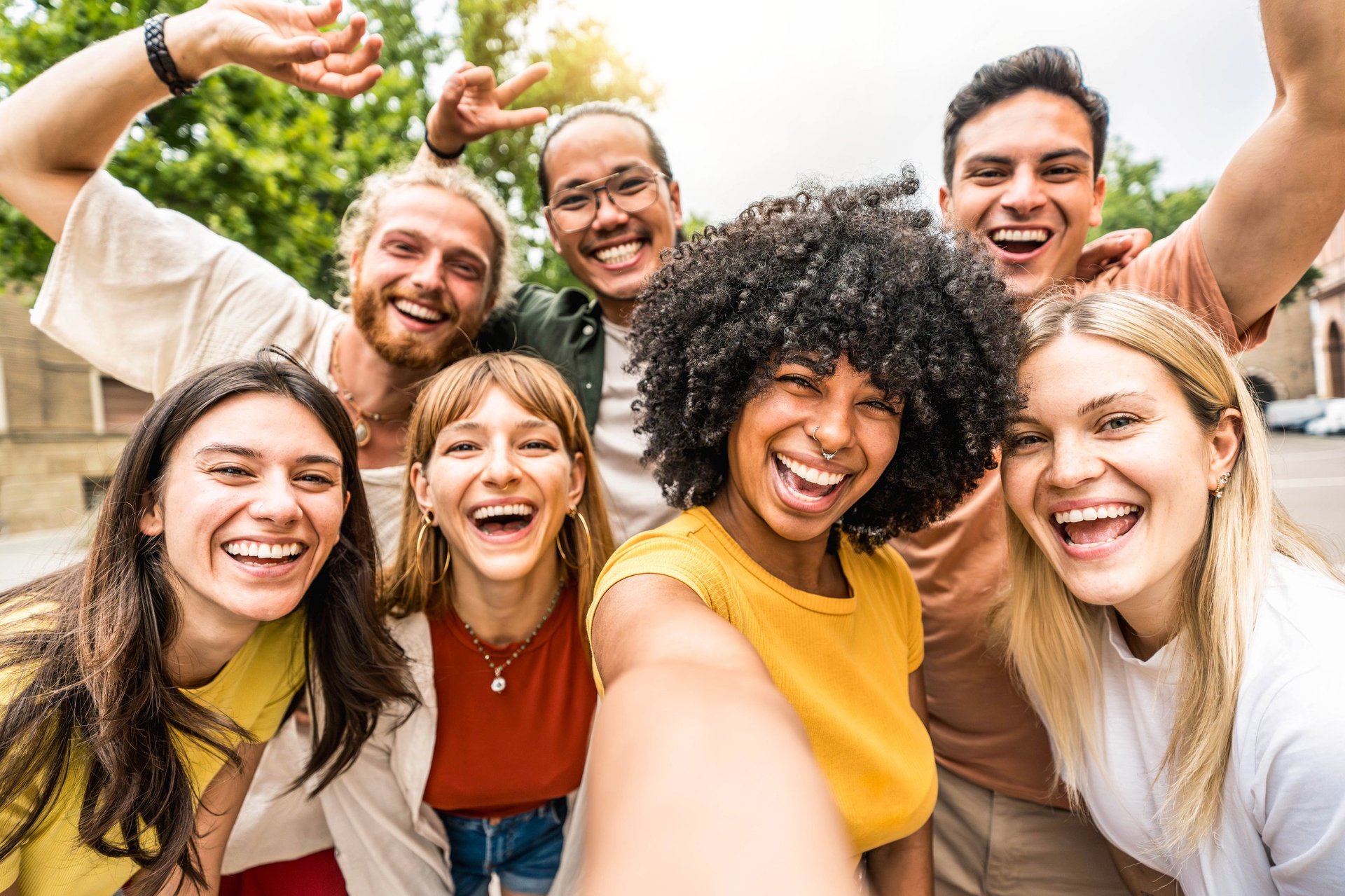 Happy group of young people smiling together